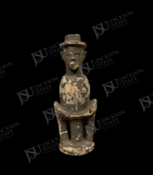 Seated Colon Figure with Brimmed Hat